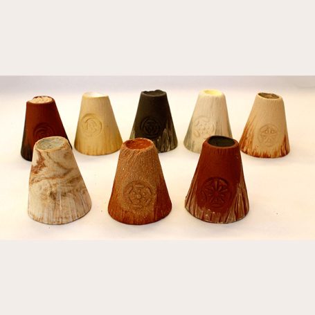 Collection of nine decorative ceramic cones in various earth tones.