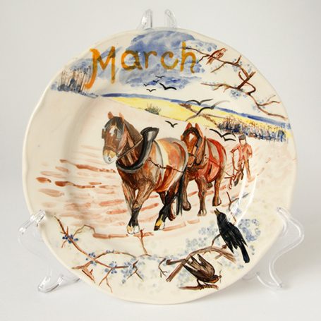 Ceramic plate depicting two horses in a winter landscape, labelled "March."